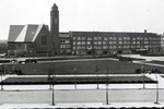 Kerk vanuit het Javaplantsoen, rechts een blok woningen onmiskenbaar van Kruyswijk
<br/>
Beeldbank Stadsarchief, jaren 20-30